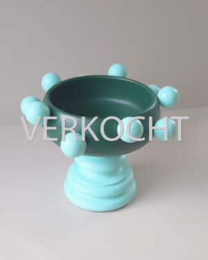 Groene schaal met 10 ballen
